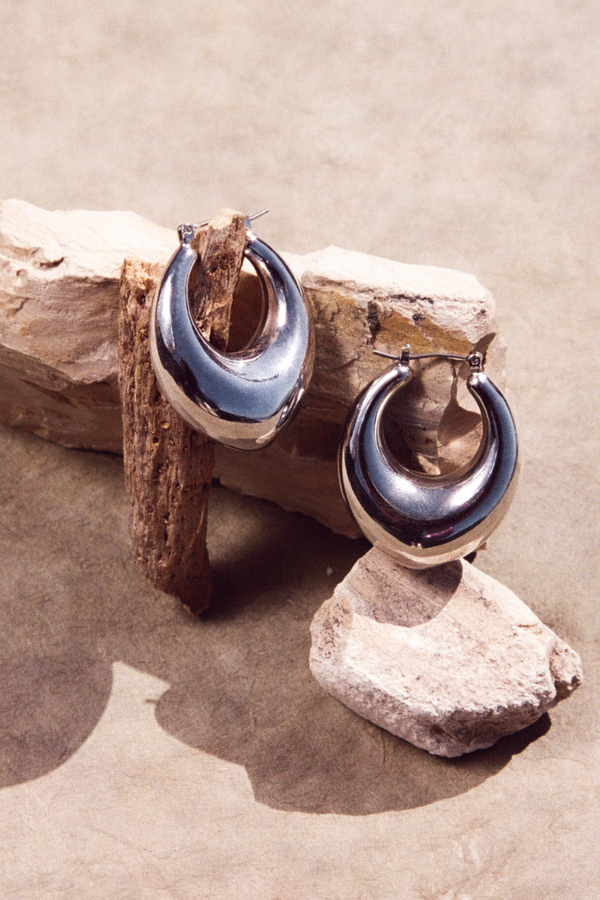 NAiiA Adelaide Hoops _  Rhodium Teardrop Hoop Earrings Still Life