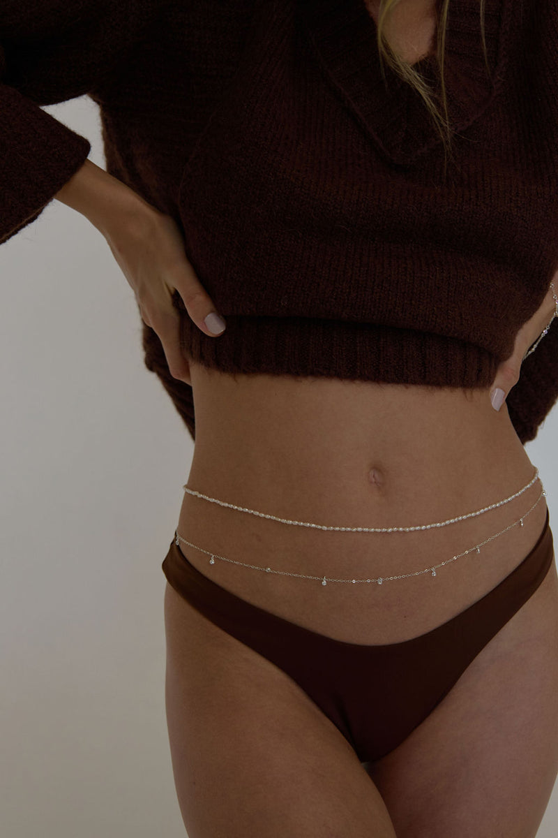 naiia brigitte belly chain in silver on model