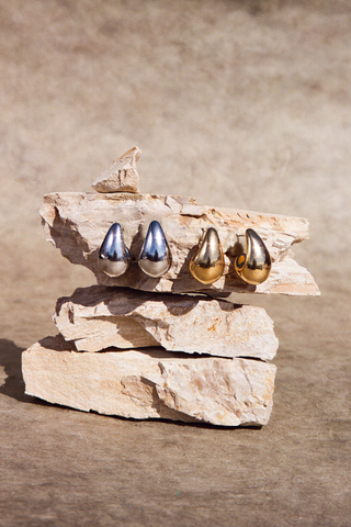 NAiiA Luna Earrings _ 14K Yellow Gold and Rhodium Teardrop Earrings still life