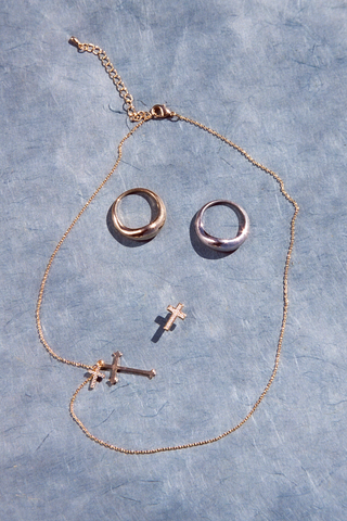 NAiiA Mini Cross Studs | 14K Yellow Gold and Pave CZ Cross Stud Earrings still life