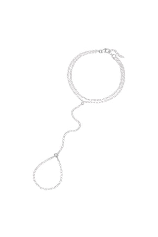A delicate silver hand chain featuring a double bracelet, displayed on a solid white background.