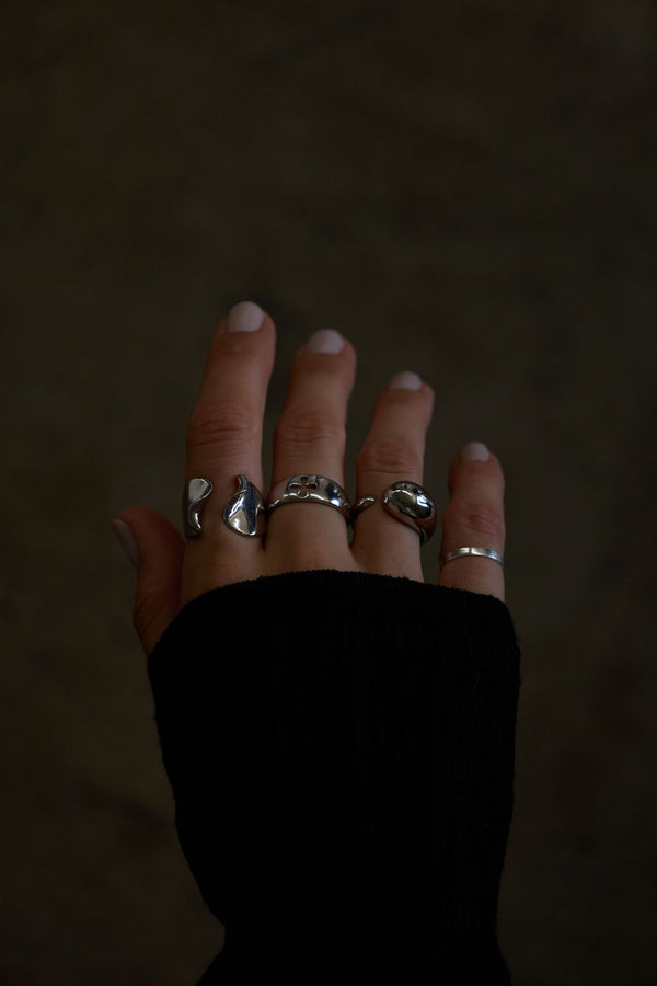 NAiiA silver rings on model