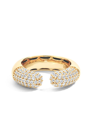 Gold ring with white sapphire accents on a white background