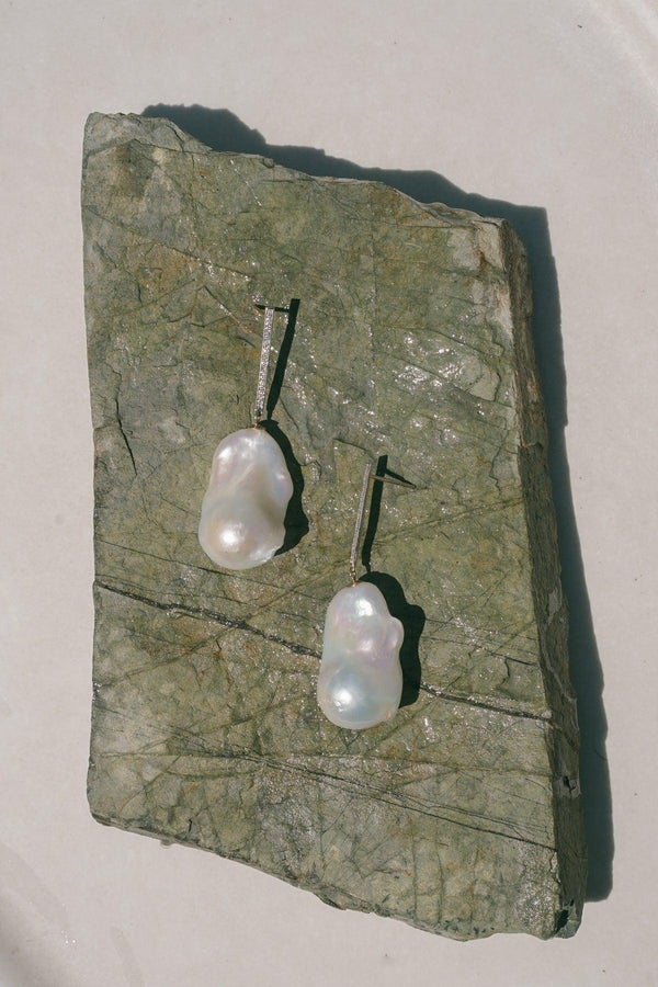 NAiiA Michelle earrings - Baroque Pearl earrings completed with 14K solid gold bars and pave diamonds 