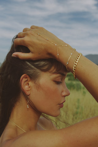 14k gold-filled cz hand chain on model