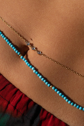 NAiiA Dorsa Belly Chain 14K Yellow Gold Turquoise Belly Chain on model