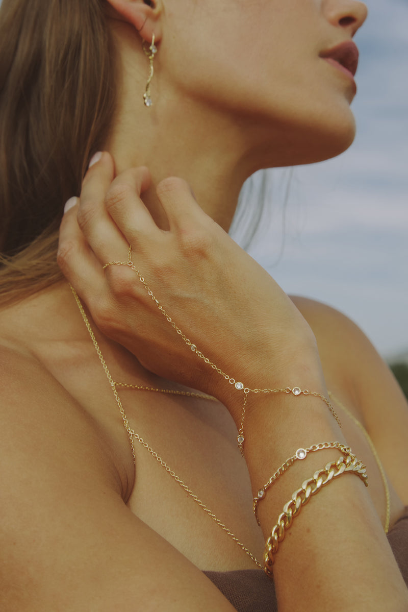 Natalie - NAiiA - 14K gold-filled cuban link bracelet on model