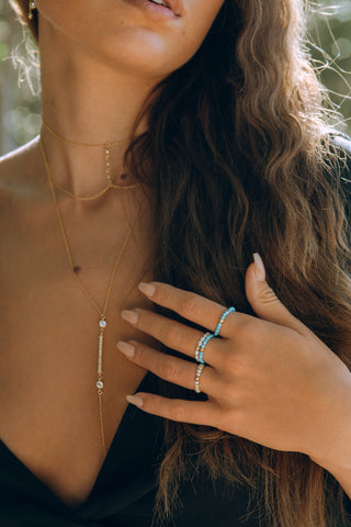 NAiiA Nika Ring  14K Yellow Gold Stretchy Pearl Ring on model