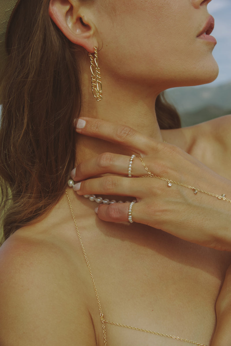 Sade - NAiiA 14K gold-filled chain earring on model