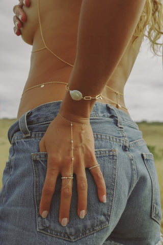 14k gold-filled pearl hand chain on model 