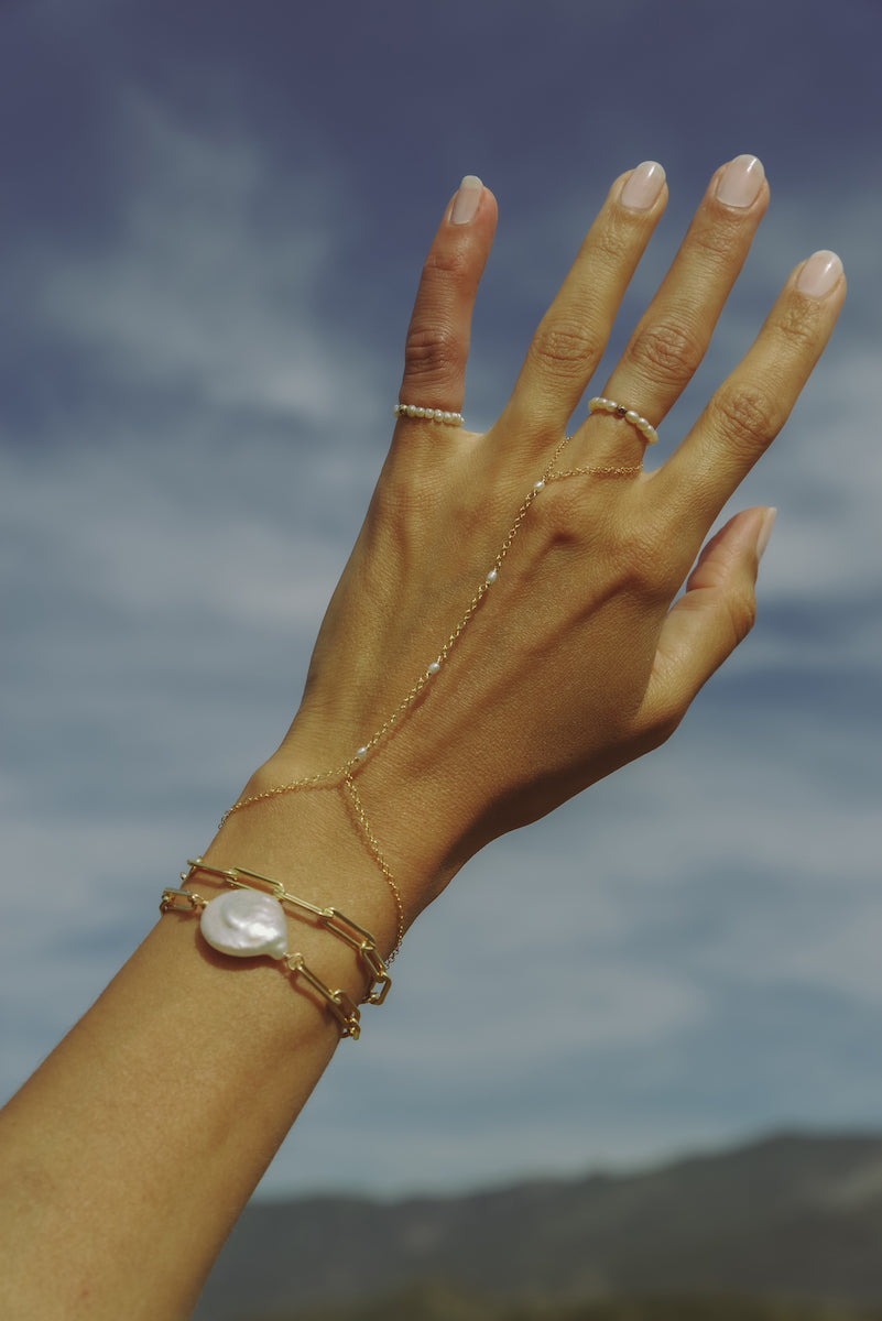 NAiiA Sophia Hand Chain | 14K Yellow Gold Pearl Hand Chain